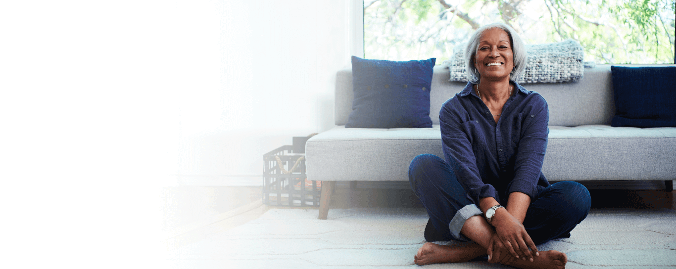 a woman sitting on the floor