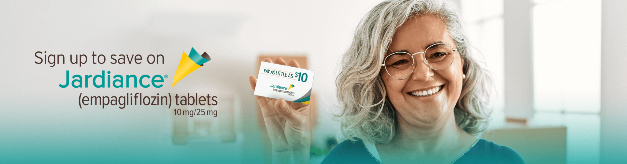 Woman Smiling Whilst Holding a Jardiance Savings Card