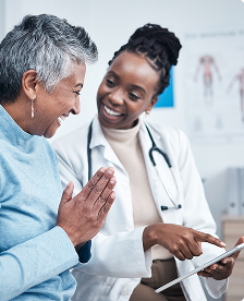Female Doctor Talking To Patient